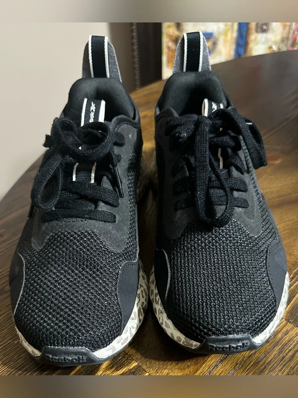 Reebok Black Athletic Sneakers with Leopard-Print Sole